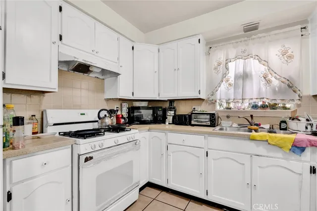 a room with furniture and a flat screen tv