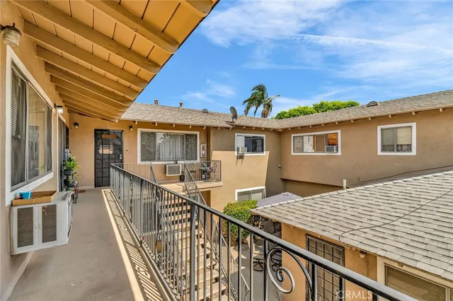 a view of balcony with a potted plant