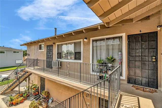 a kitchen with a sink cabinets and stainless steel appliances
