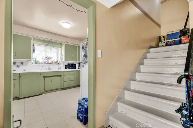 a view of a kitchen and dining area with furniture