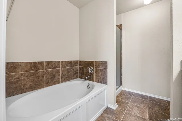 a bathroom with a bathtub