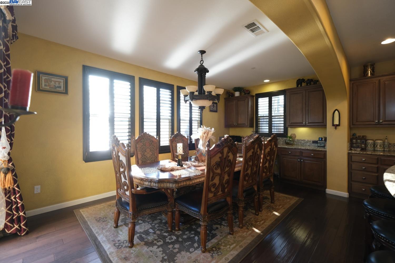 3252 Carpenter Way San Ramon, CA 94582 - Photo 14 of 58 a view of a dining room with furniture window and wooden floor