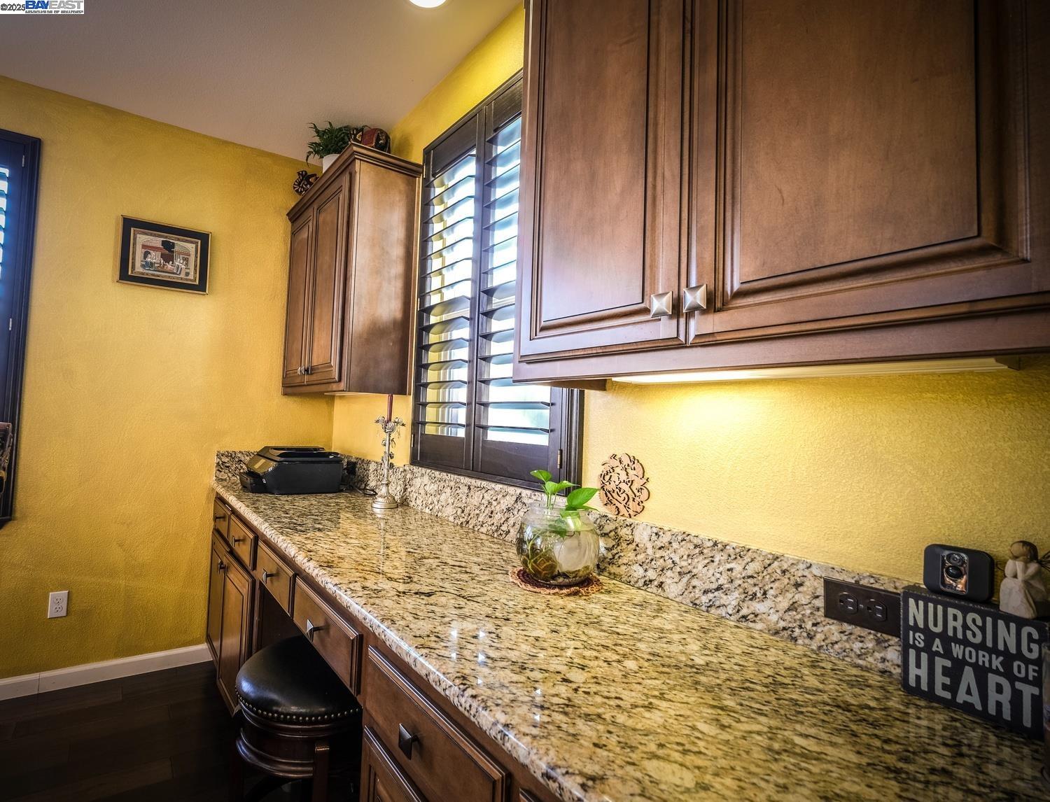 3252 Carpenter Way San Ramon, CA 94582 - Photo 22 of 58 a kitchen with a sink and cabinets