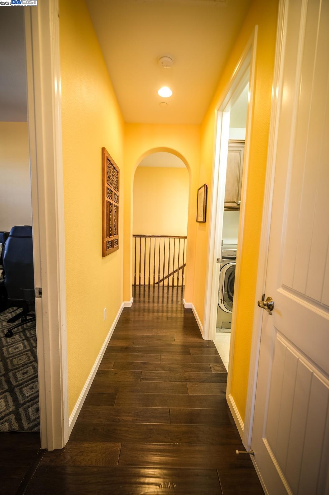3252 Carpenter Way San Ramon, CA 94582 - Photo 43 of 58 a view of a hallway with wooden floor and staircase