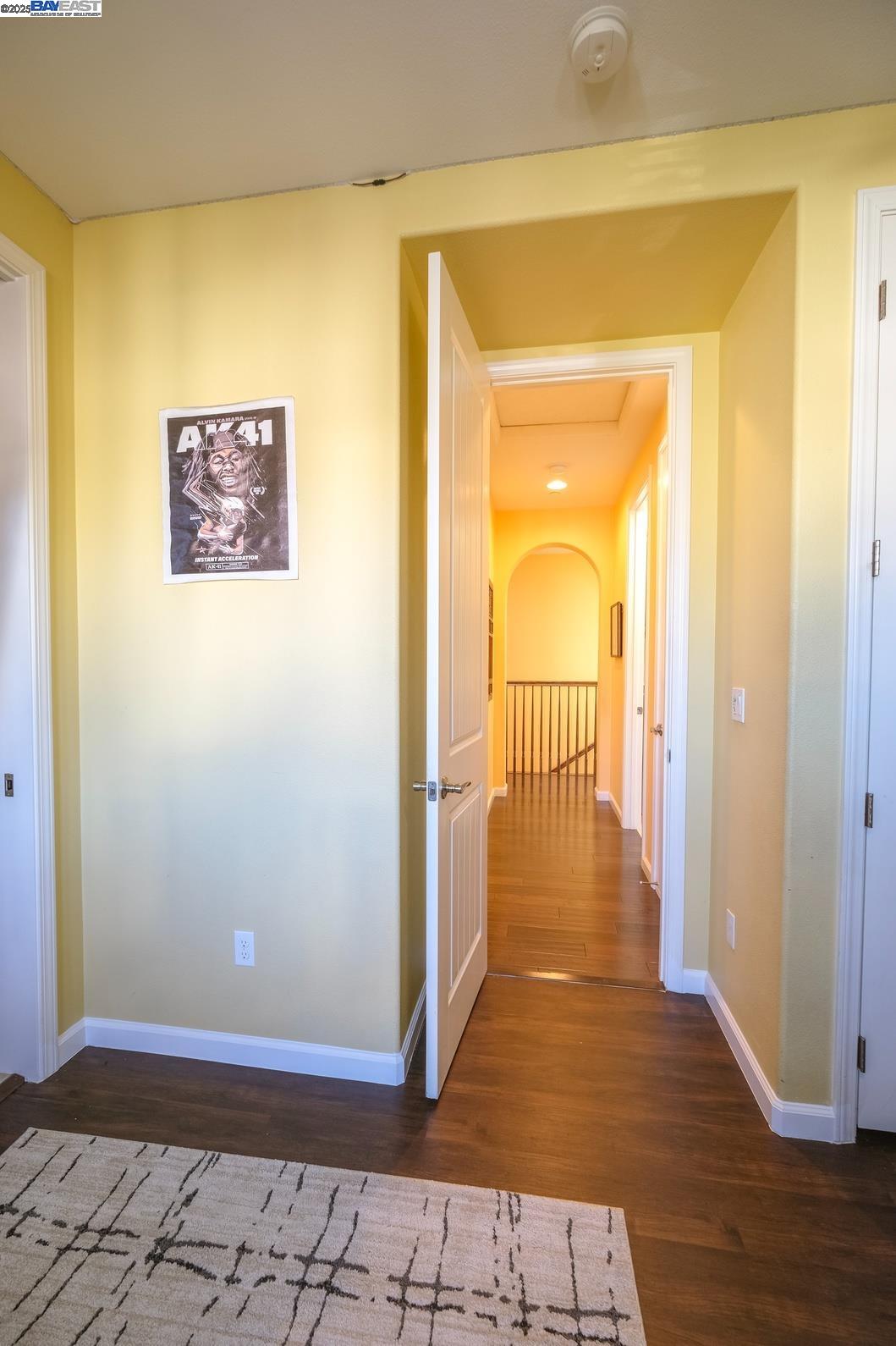3252 Carpenter Way San Ramon, CA 94582 - Photo 48 of 58 a view of a hallway with wooden floor