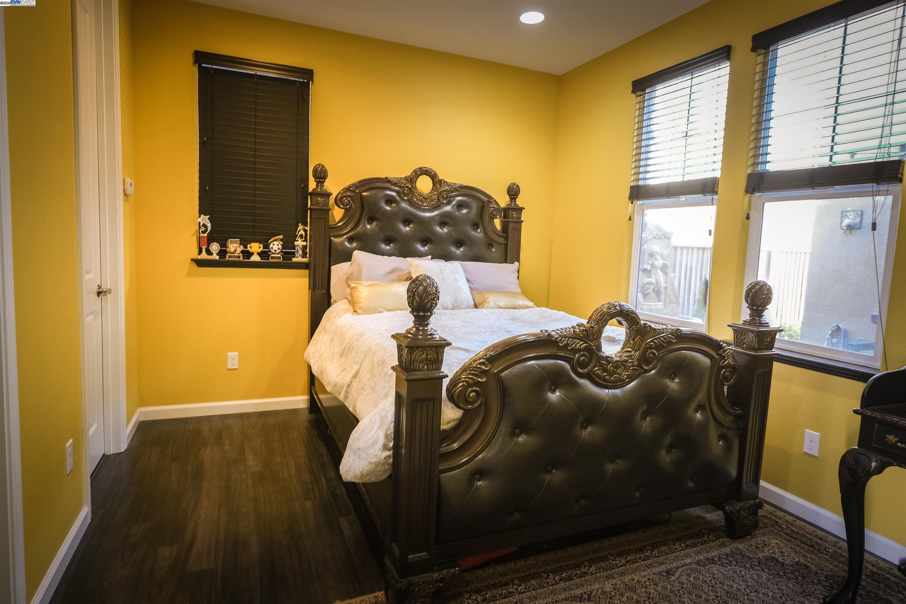 3252 Carpenter Way San Ramon, CA 94582 - Photo 6 of 58 a bedroom with a bed and wooden floor