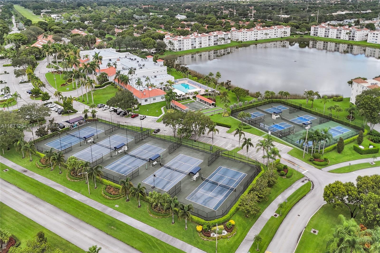 6139 Sunrise Pointe Court, Unit A Delray Beach, FL 33484 - Photo 8 of 41 an aerial view of a city