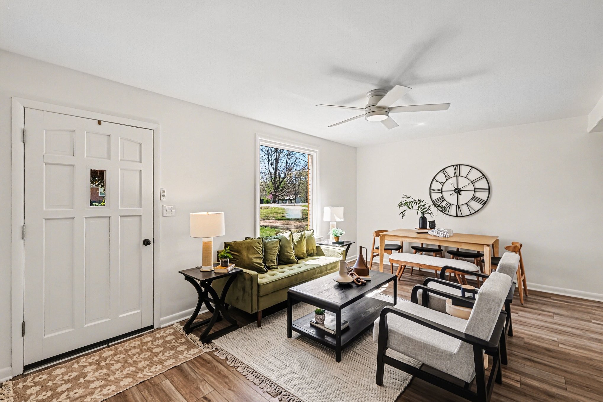1307 Atlas Street Murfreesboro, TN 37130 - Photo 1 of 24 a living room with furniture a clock and a window
