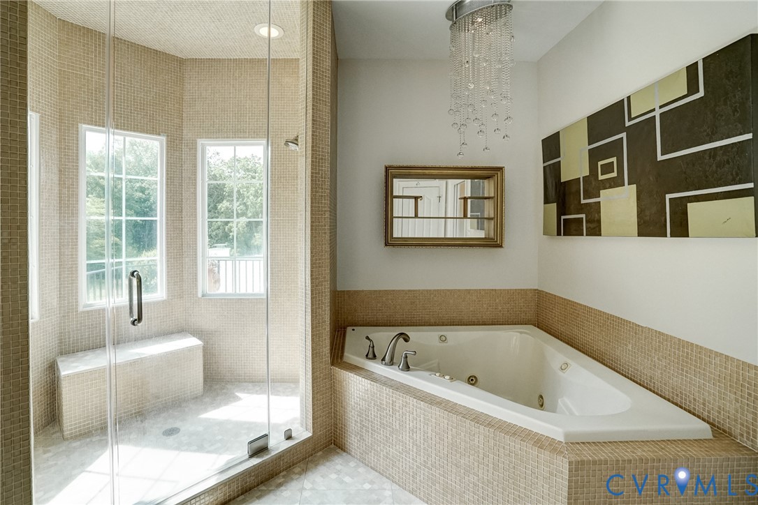 721 Meadow View Ridge Manakin-Sabot, VA 23103 - Photo 23 of 45 a bathroom with a bathtub and a shower