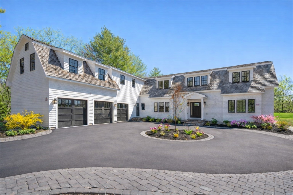 10 Hitching Post Lane Weston, MA 02493 - Photo 1 of 42 a front view of house with yard