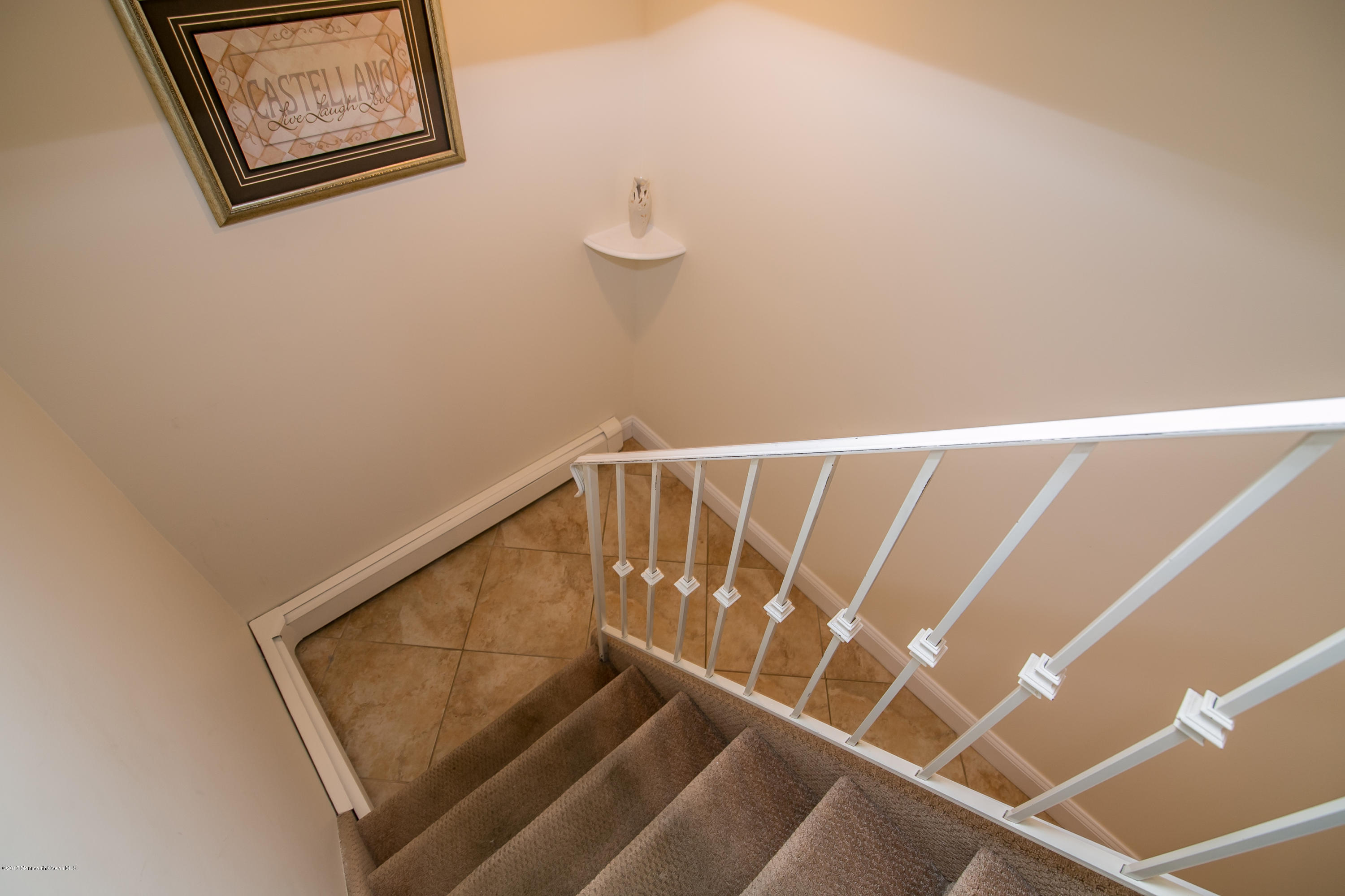473 Lloyd Road Aberdeen, NJ 07747 - Photo 26 of 34 a view of staircase with rug and white wall