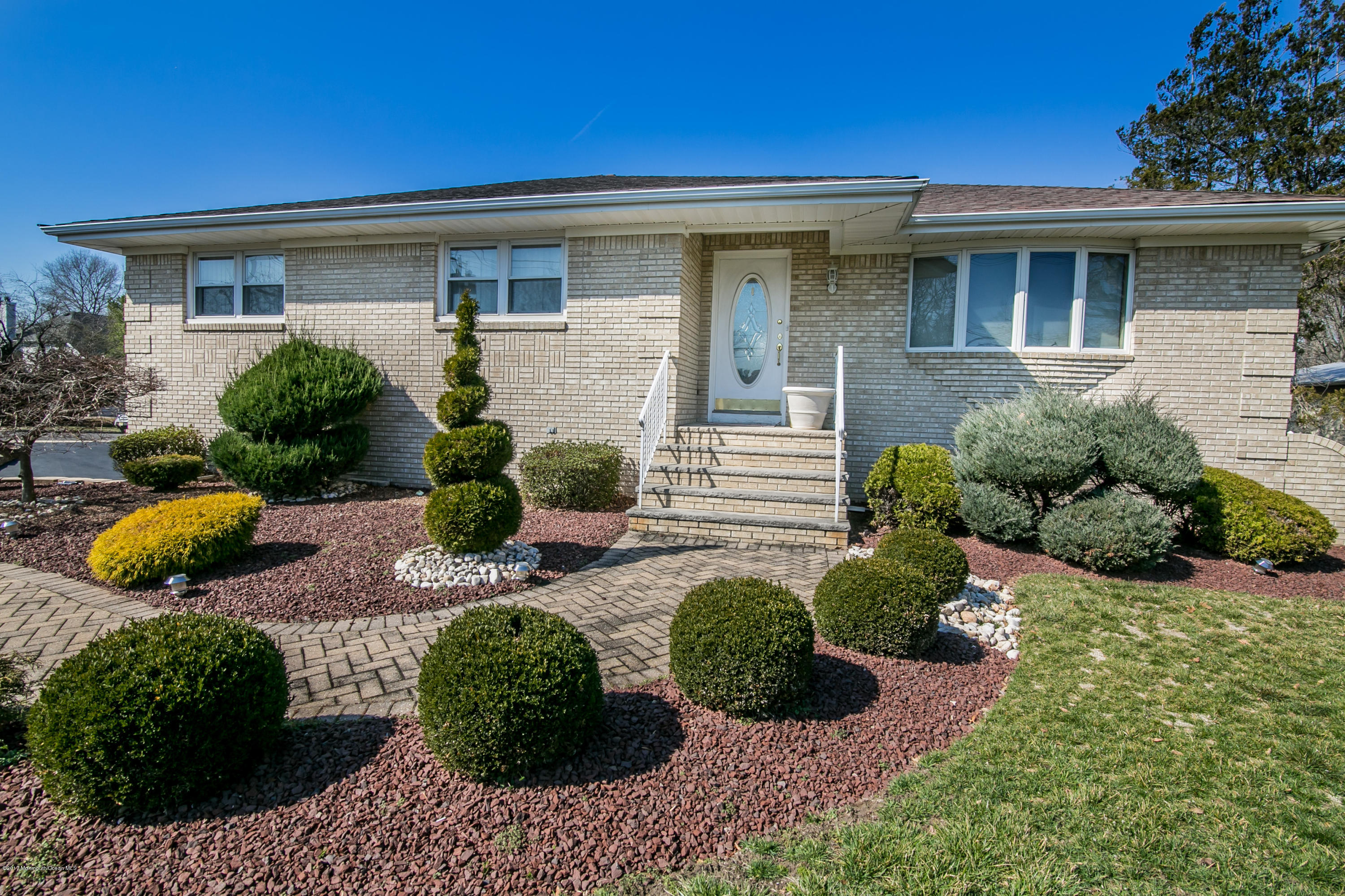 473 Lloyd Road Aberdeen, NJ 07747 - Photo 5 of 34 a view of a house with a yard and potted plants