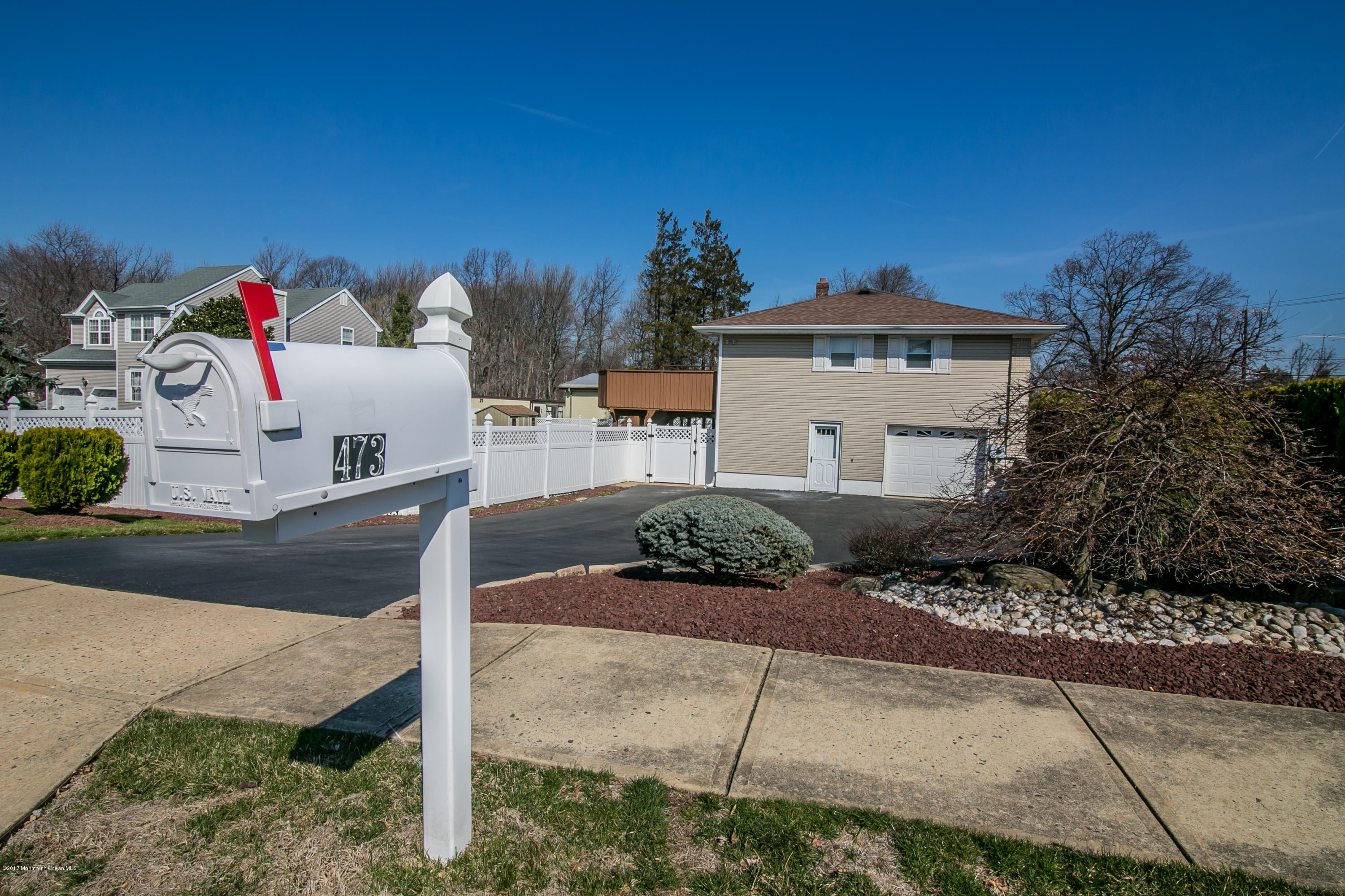 473 Lloyd Road Aberdeen, NJ 07747 - Photo 6 of 34 a house view with a outdoor space