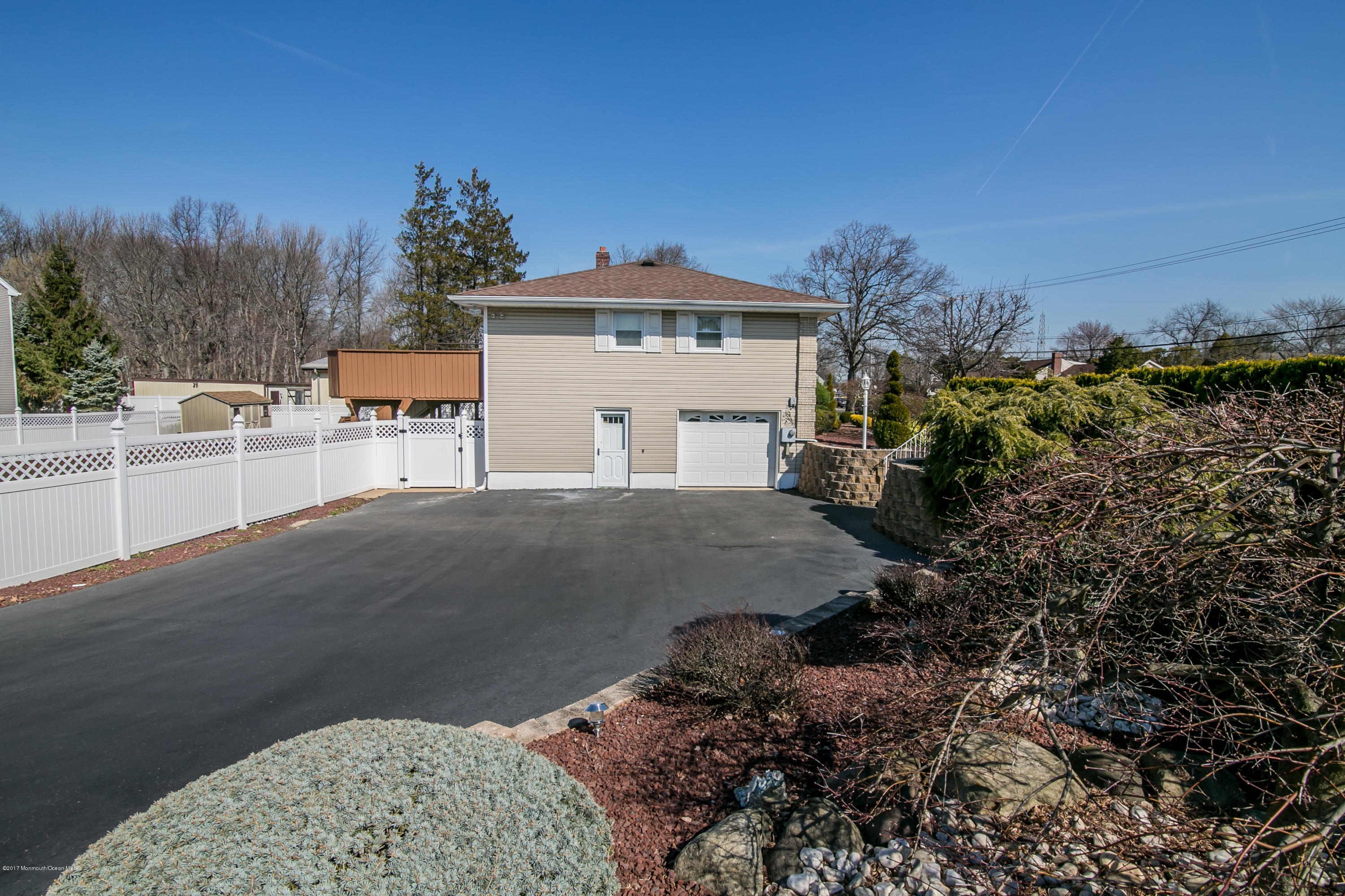 473 Lloyd Road Aberdeen, NJ 07747 - Photo 7 of 34 a view of a house with a yard