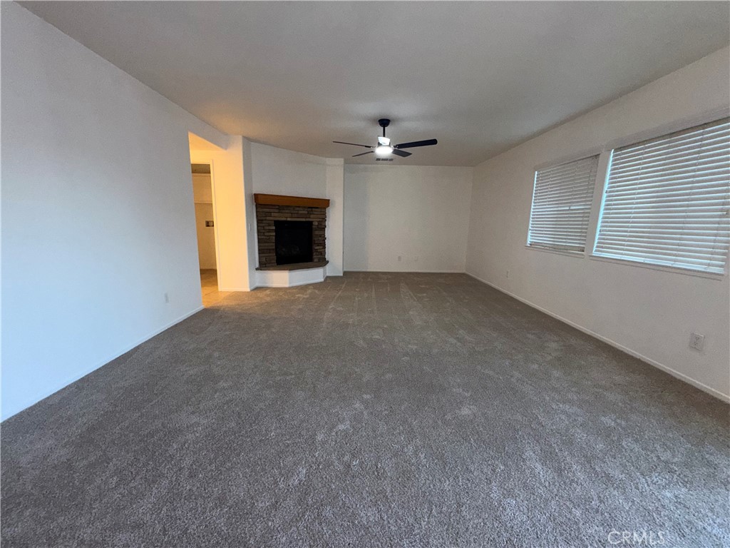 29162 Hydrangea Street Murrieta, CA 92563 - Photo 12 of 46 a view of empty room with a fireplace
