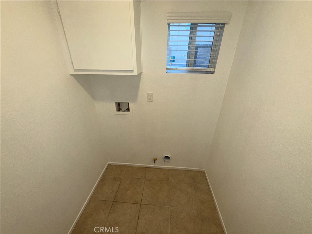 29162 Hydrangea Street Murrieta, CA 92563 - Photo 14 of 46 a view of a small space with a window