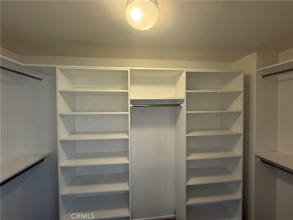 29162 Hydrangea Street Murrieta, CA 92563 - Photo 31 of 46 a view of walk in closet with empty racks