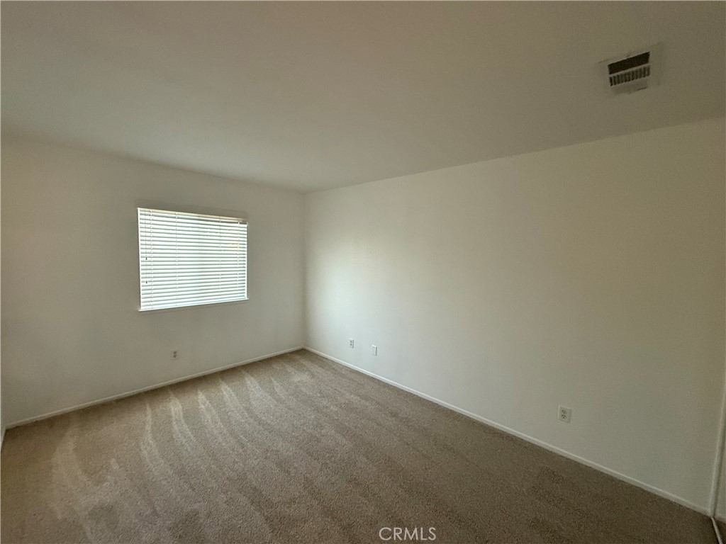 29162 Hydrangea Street Murrieta, CA 92563 - Photo 37 of 46 an empty room with a window