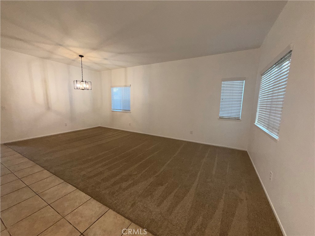 29162 Hydrangea Street Murrieta, CA 92563 - Photo 5 of 46 an empty room with windows