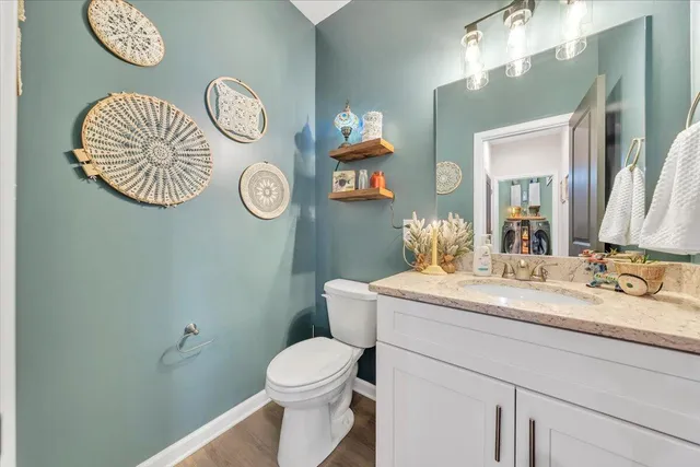 a bathroom with a toilet and a sink