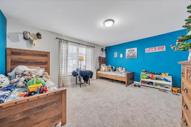 a children room with toys and a couch