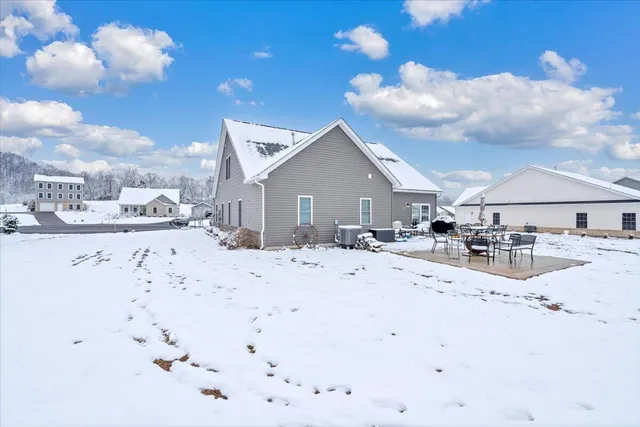 a view of a kitchen with a sink and cabinets