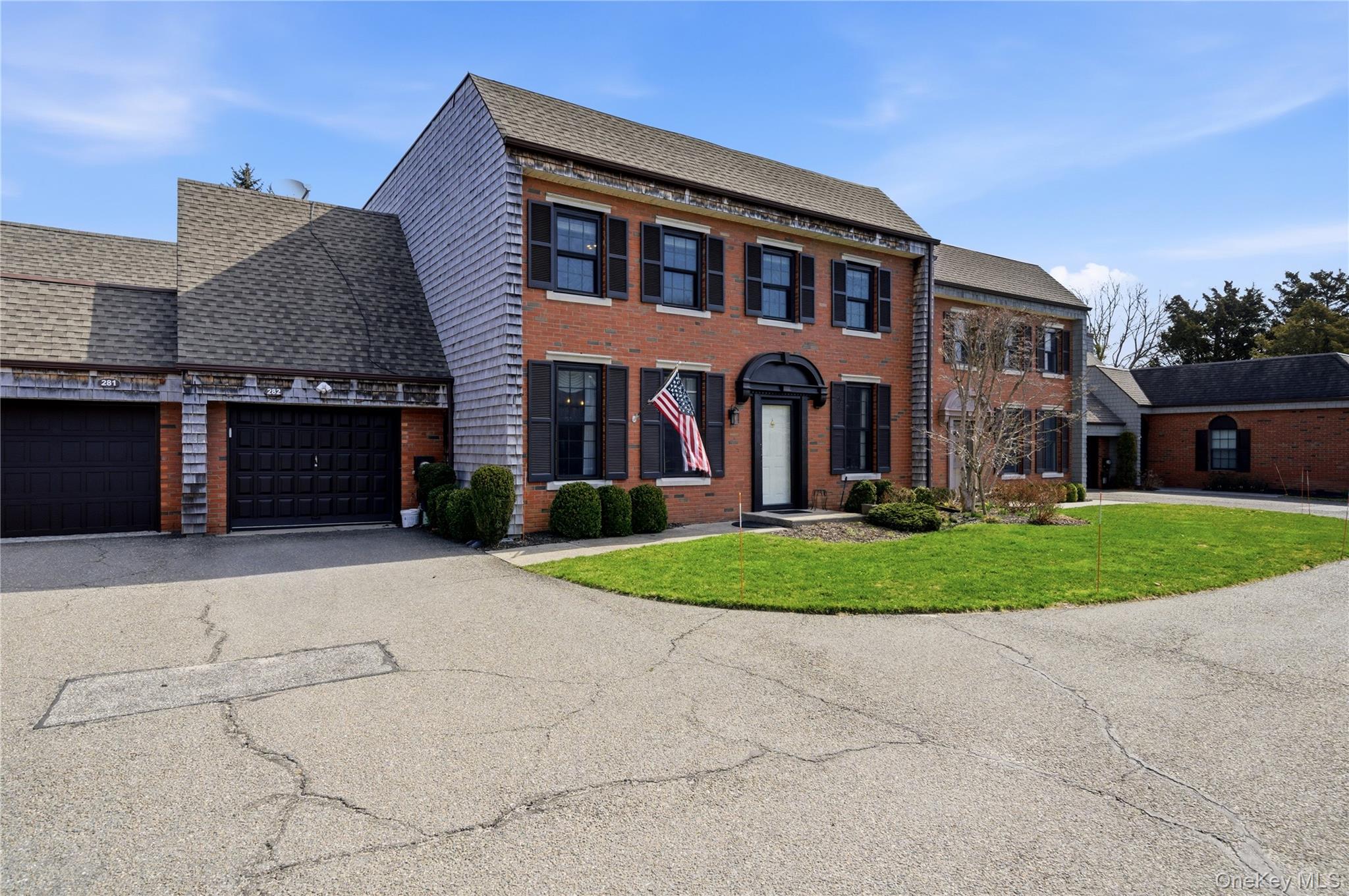 282 Helm Lane Bay Shore, NY 11706 - Photo 2 of 48 front view of a house with a yard