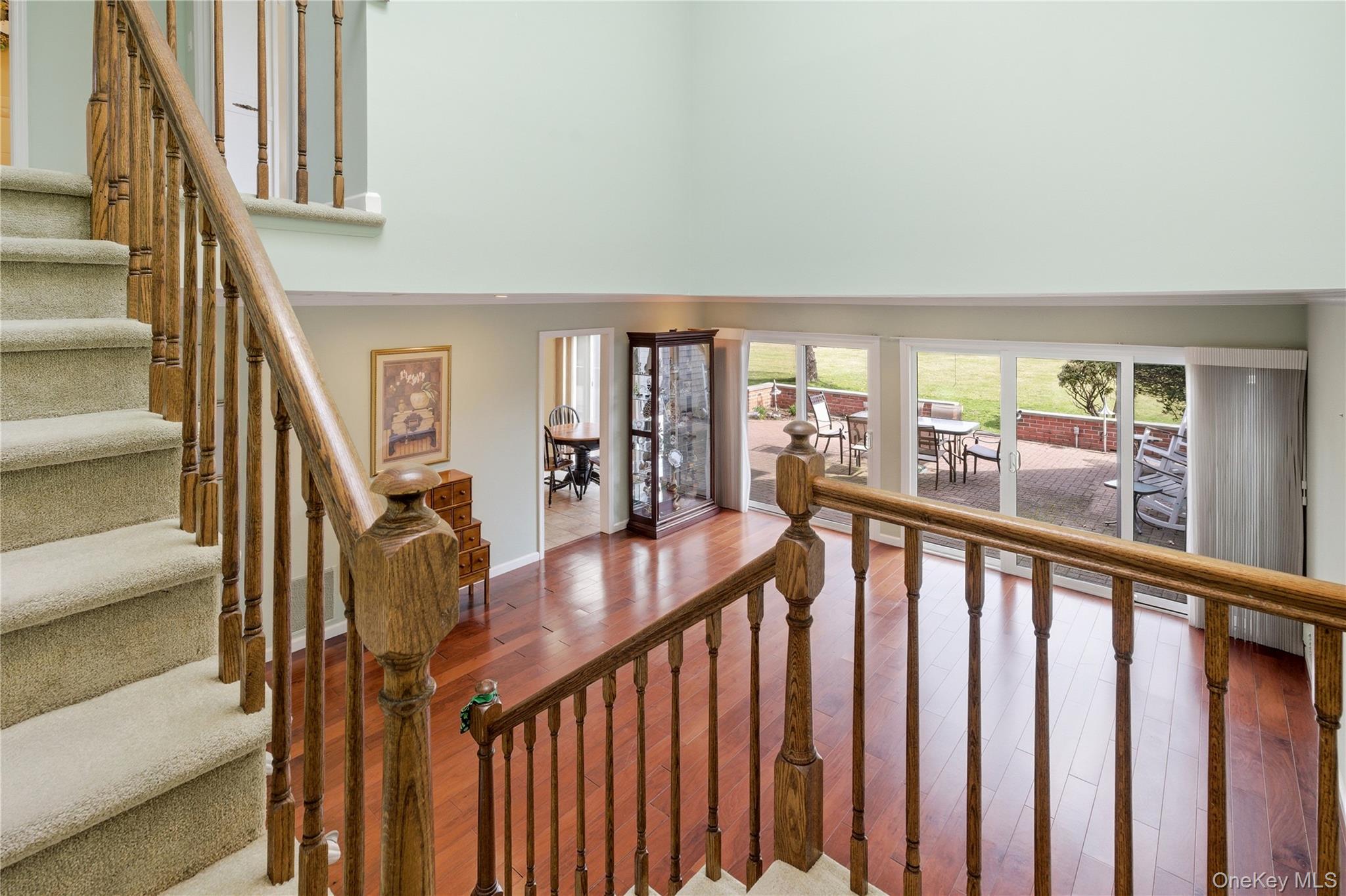 282 Helm Lane Bay Shore, NY 11706 - Photo 21 of 48 a view of staircase with furniture and a large window