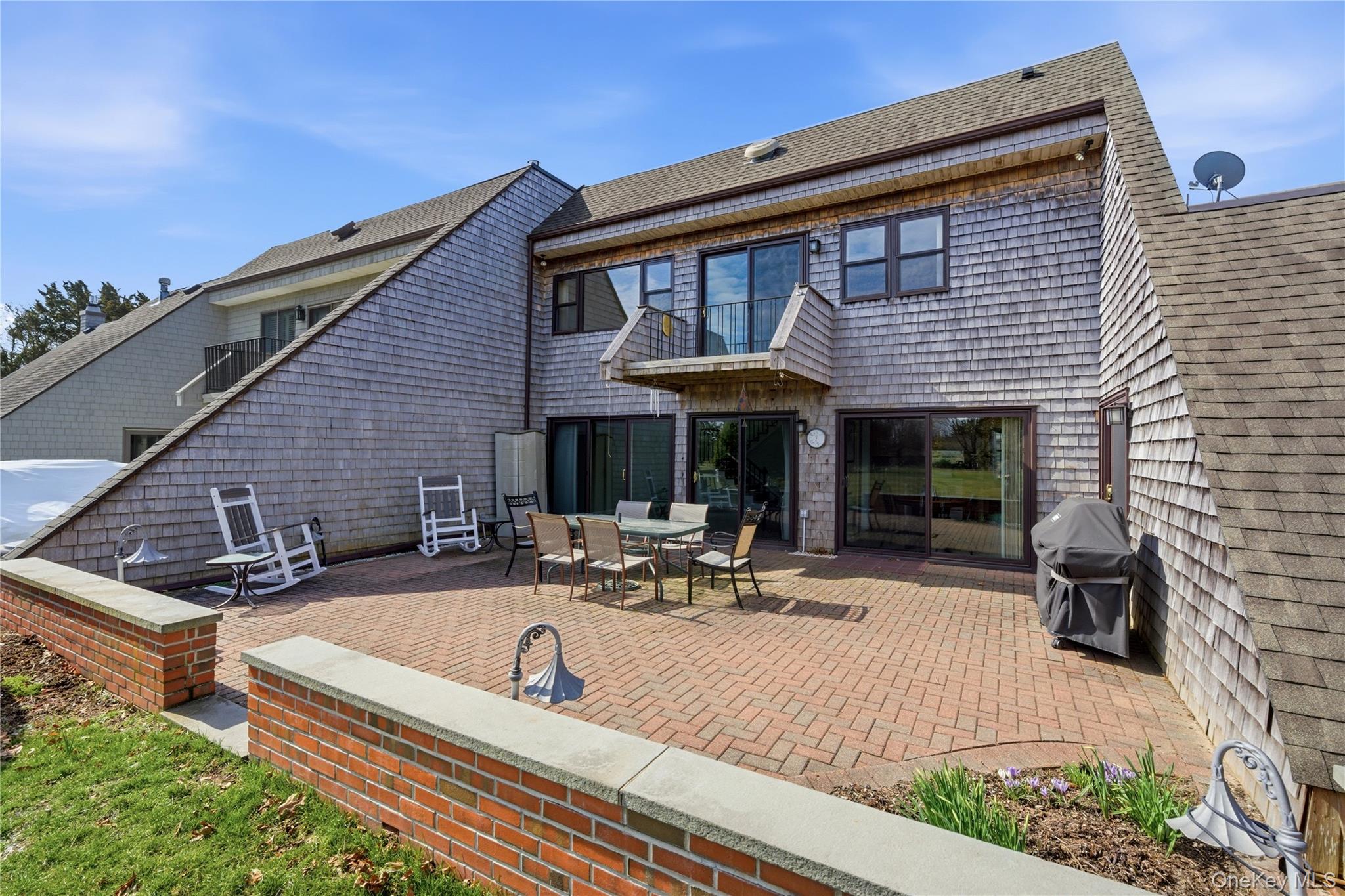 282 Helm Lane Bay Shore, NY 11706 - Photo 32 of 48 a view of house with outdoor seating area