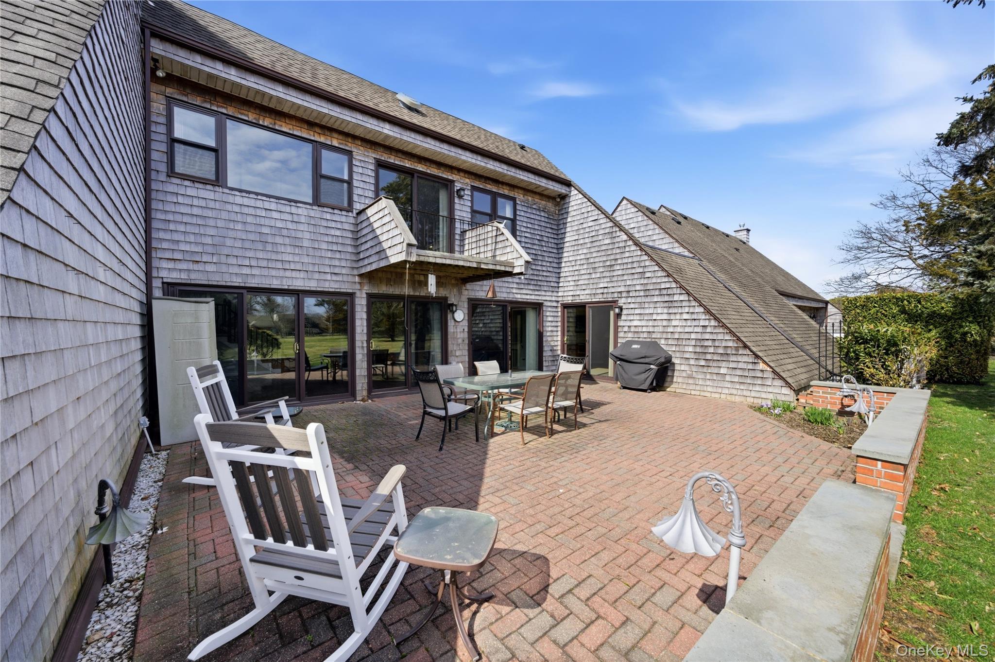 282 Helm Lane Bay Shore, NY 11706 - Photo 33 of 48 a view of house with backyard and outdoor seating