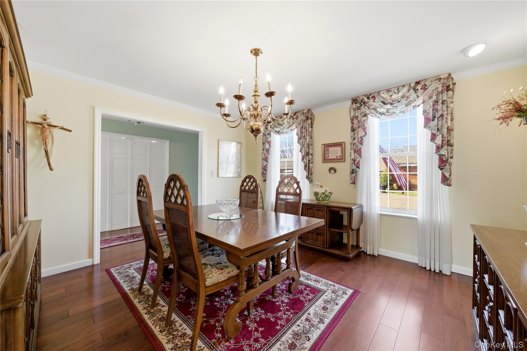 282 Helm Lane Bay Shore, NY 11706 - Photo 5 of 48 a view of a dining room with furniture and wooden floor
