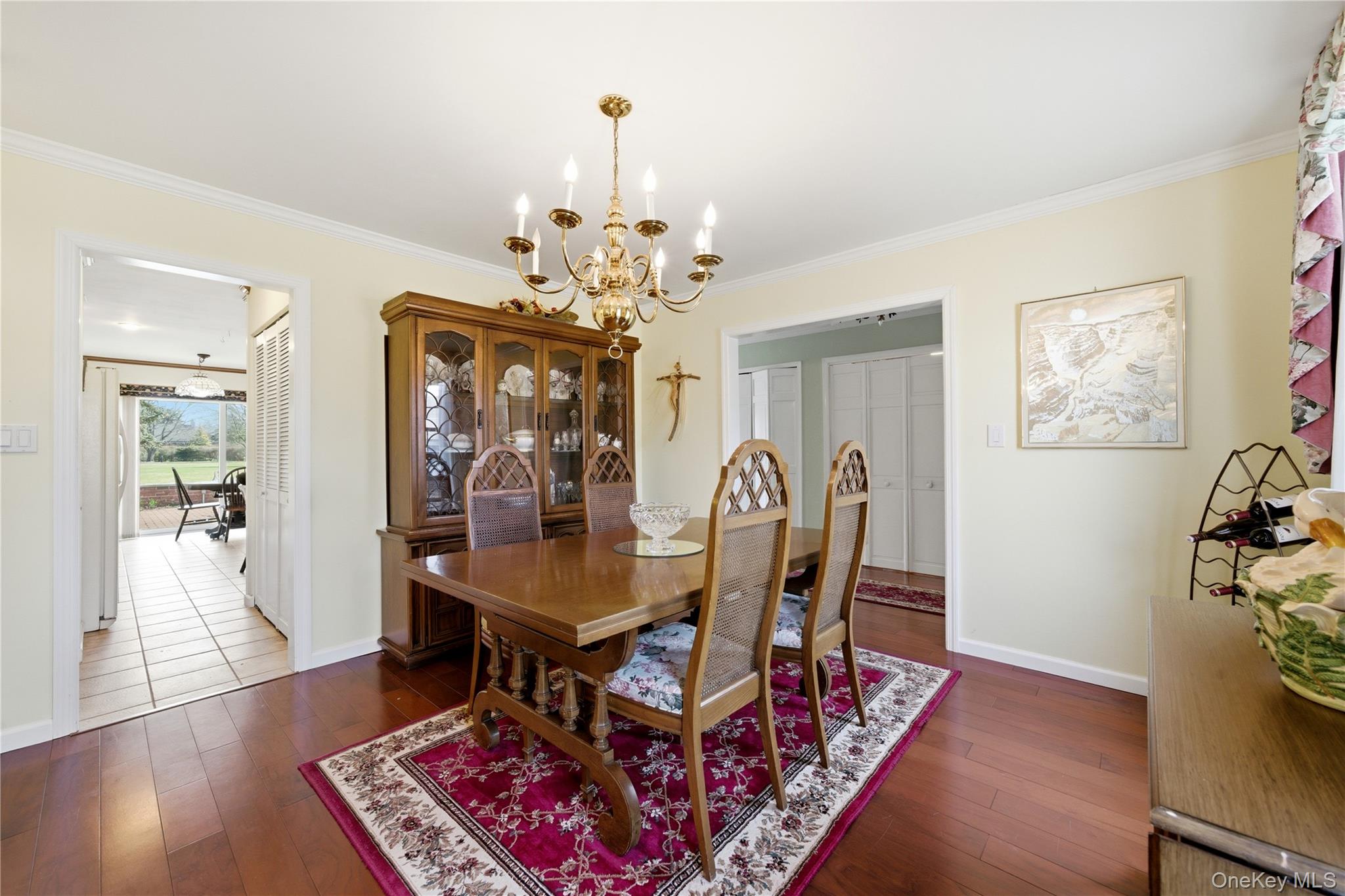 282 Helm Lane Bay Shore, NY 11706 - Photo 6 of 48 a view of a dining room with furniture and wooden floor