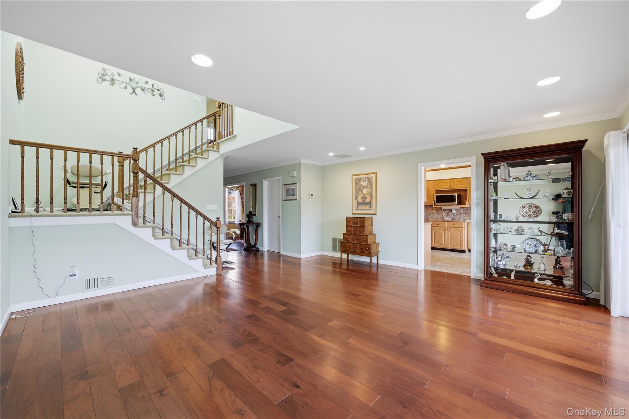 282 Helm Lane Bay Shore, NY 11706 - Photo 9 of 48 a view of an entryway with wooden floor