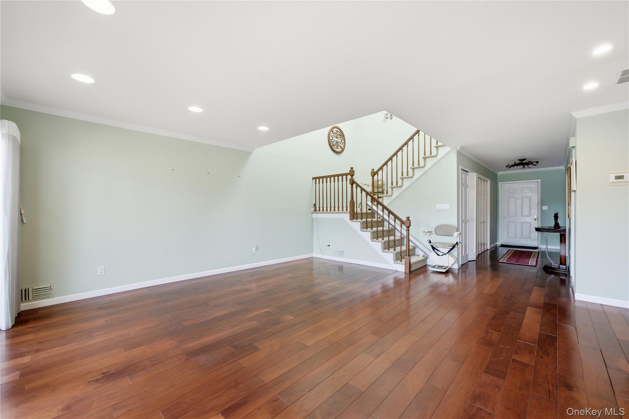 282 Helm Lane Bay Shore, NY 11706 - Photo 10 of 48 a view of an entryway with wooden floor