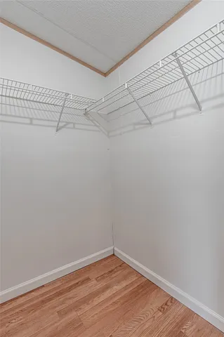 a view of a room with racks on the wall