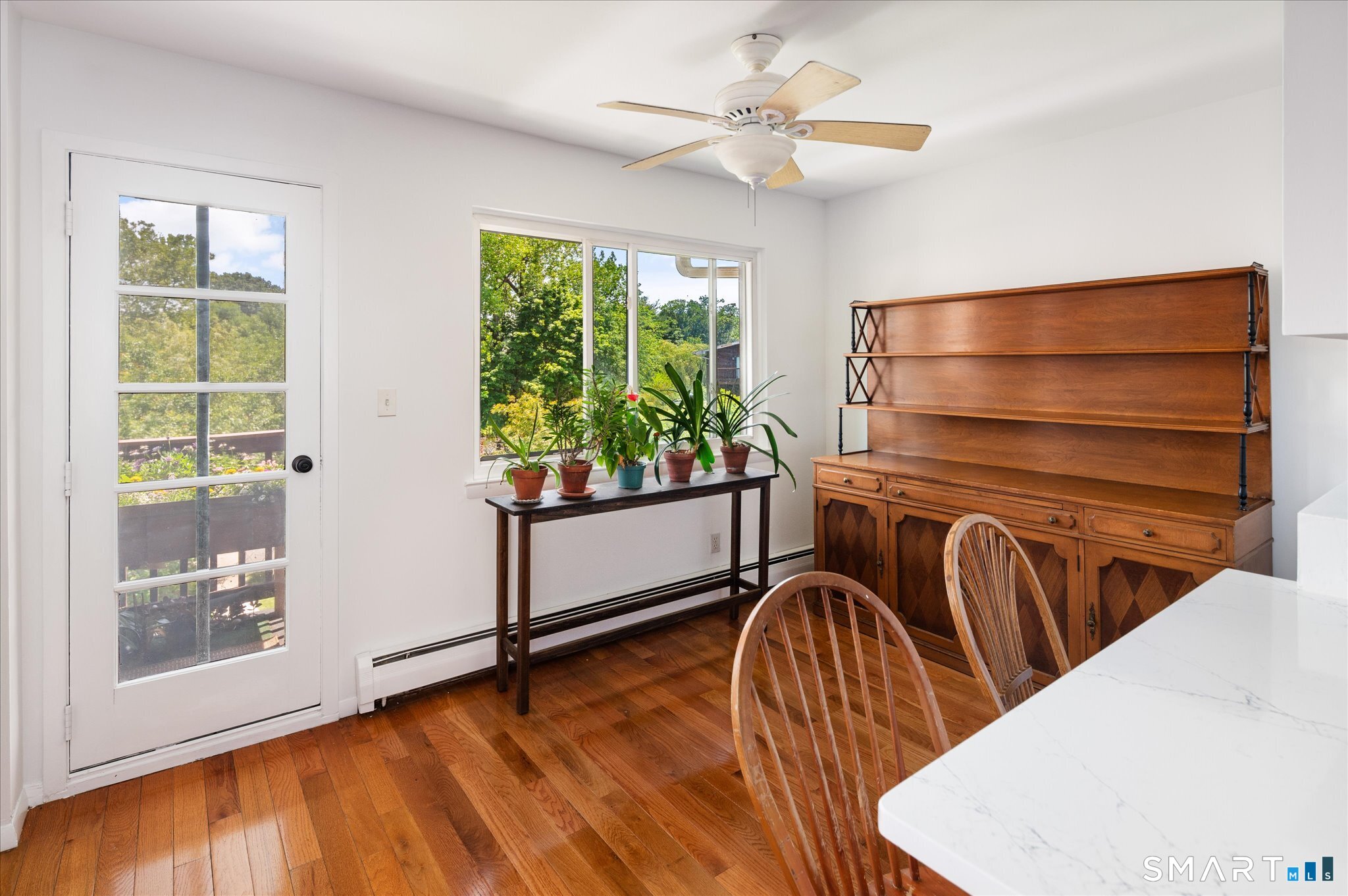 154 Cold Spring Road, Unit 23 Stamford, CT 06905 - Photo 8 of 34 The door leads to your private covered deck overlooking the river, beautiful landscaping and the pool in the distance
