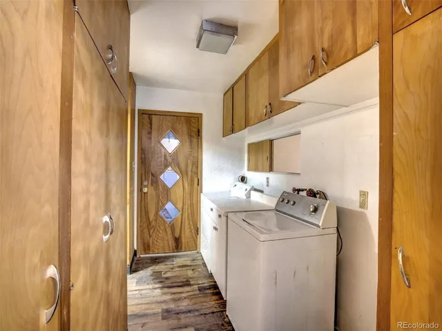 a view of hallway with washer and dryer