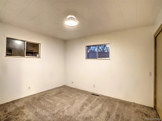 a view of a livingroom with a flat screen tv