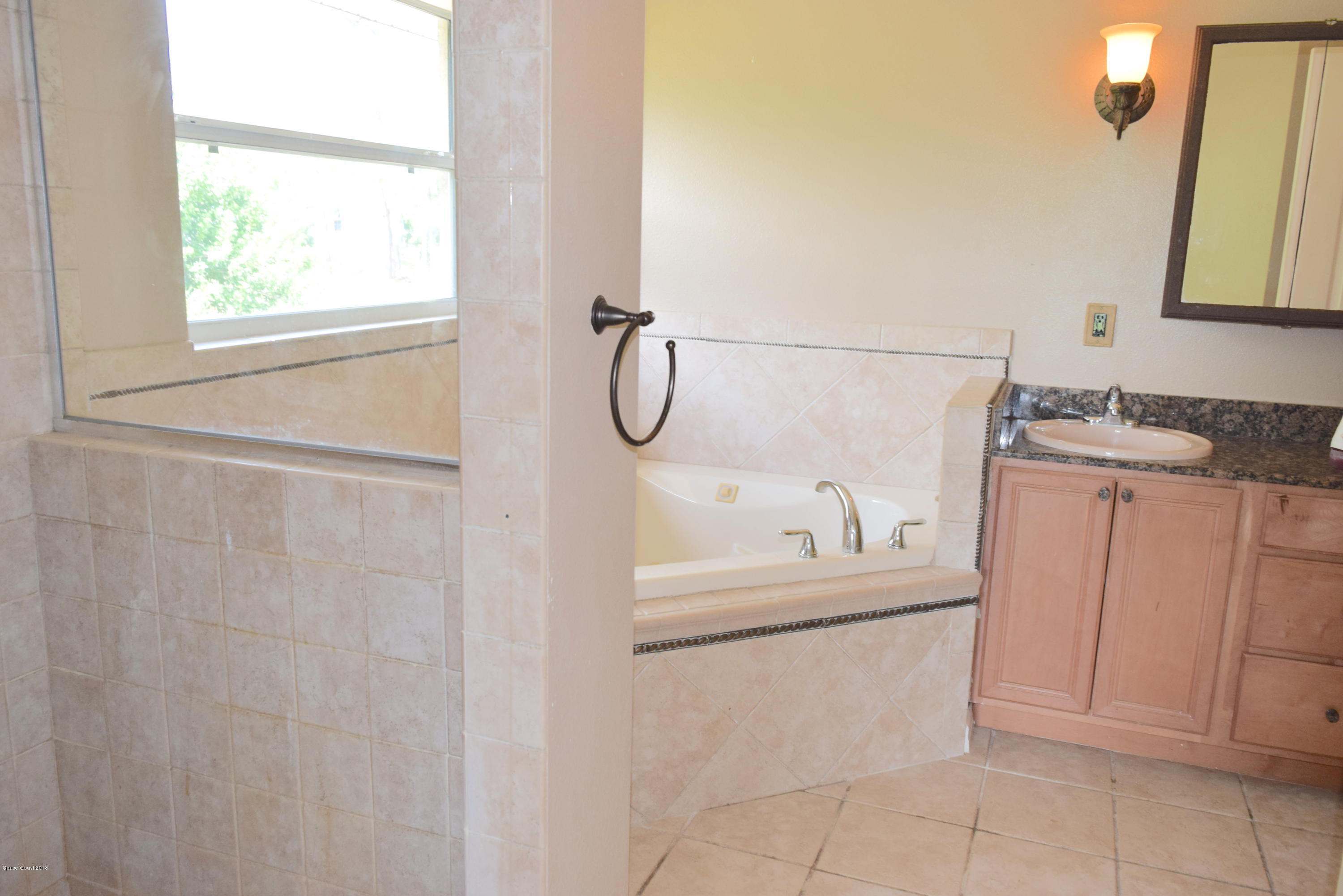 2877 Digby Road Southeast Palm Bay, FL 32909 - Photo 14 of 19 master bathroom