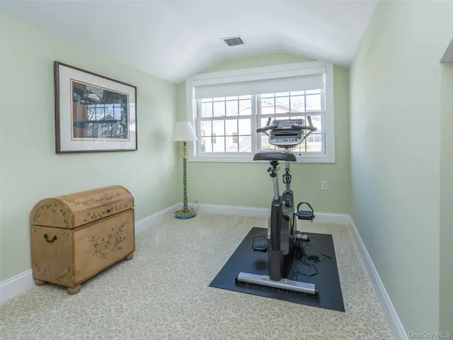 a room with furniture and a window