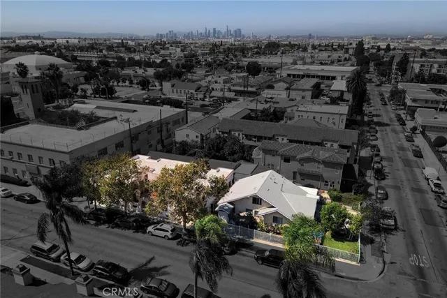 an aerial view of a houses with outdoor space