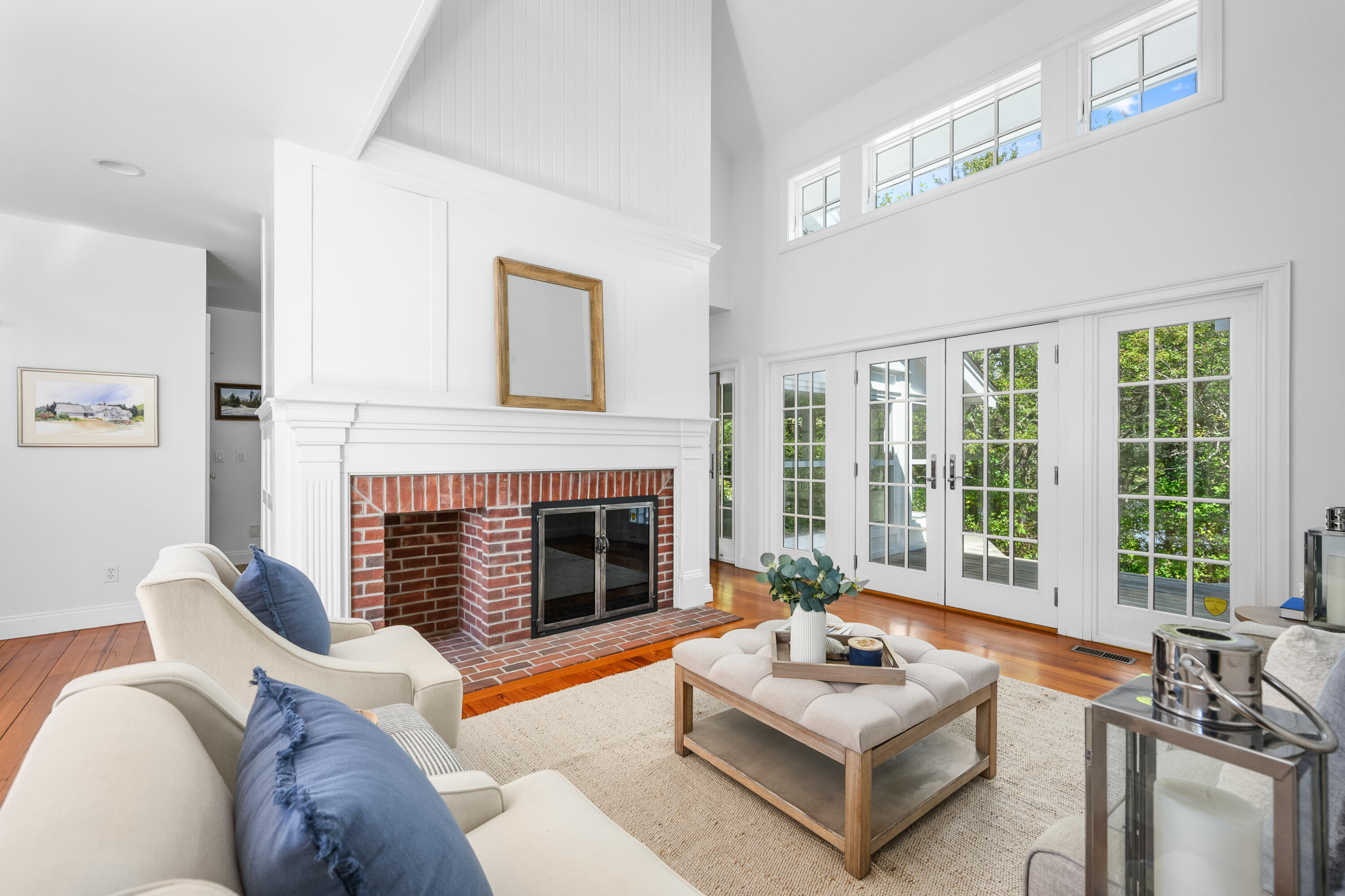 25 Pleasant View Drive Orleans, MA 02653 - Photo 31 of 56 a living room with furniture and a fireplace