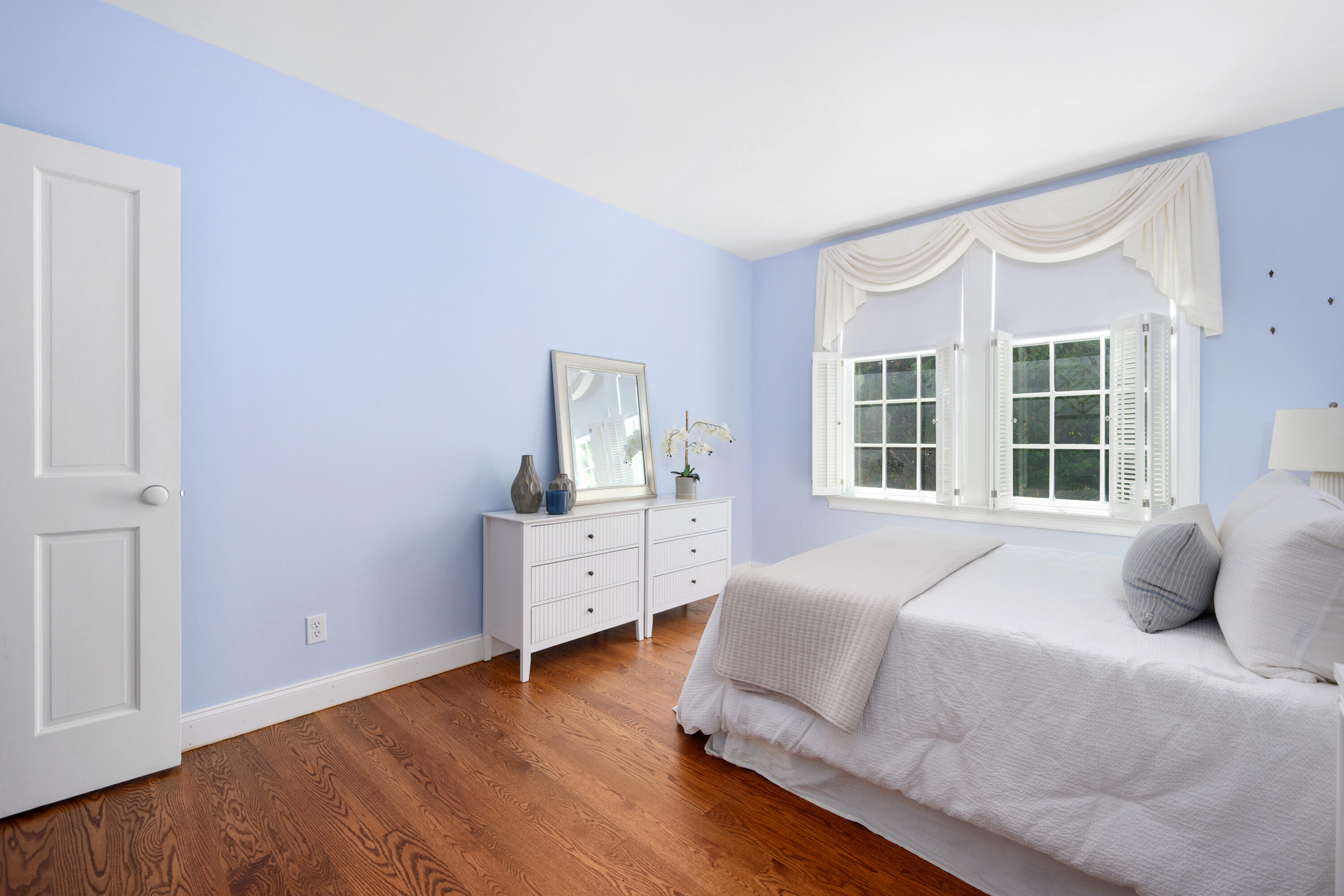 25 Pleasant View Drive Orleans, MA 02653 - Photo 34 of 56 a bedroom with a bed and wooden floor