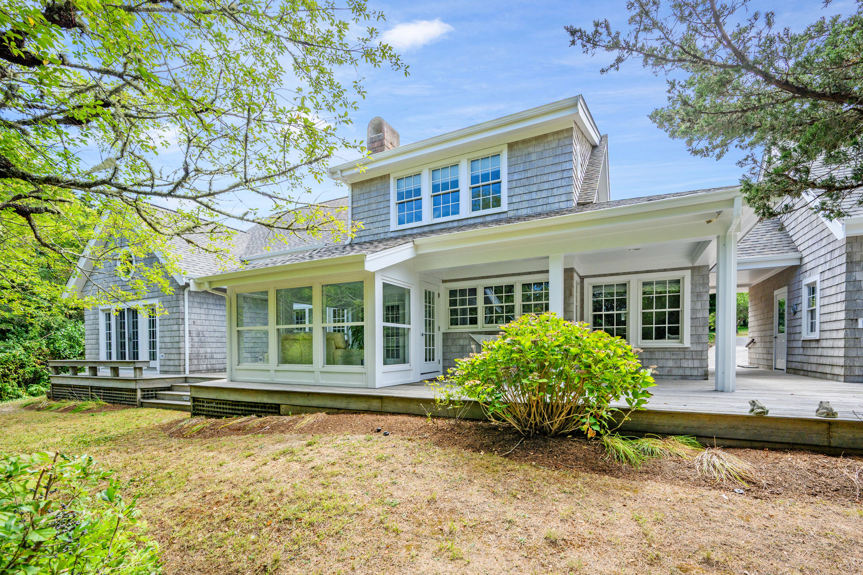 25 Pleasant View Drive Orleans, MA 02653 - Photo 4 of 56 front view of a house with a yard