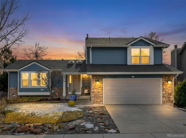 a view of a house with yard and microwave