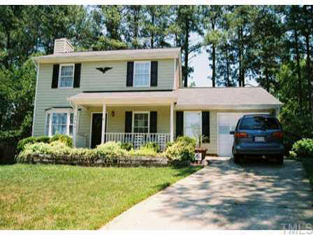4504 Lafferty Court Raleigh, NC 27616 - Photo 1 of 6 a front view of a house with garden