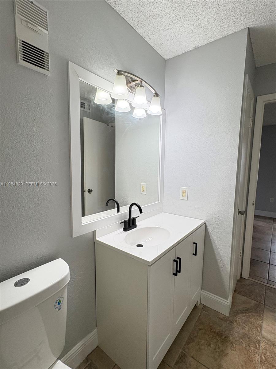 10501 Southwest 155th Court, Unit 1124 Miami, FL 33196 - Photo 12 of 15 a utility room with sink dryer and washer