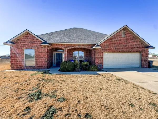 a front view of house with yard