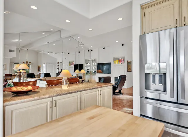 a kitchen with counter top space and appliances