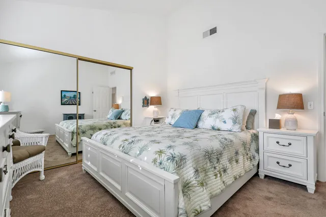 a large bed sitting in a bedroom and room